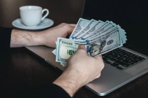 closeup-dollar-bills-male-hands-concept-making-money-working